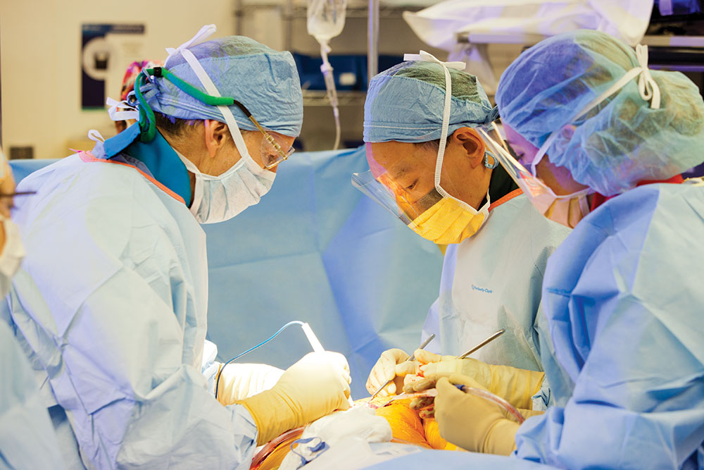 Medical team performs surgery